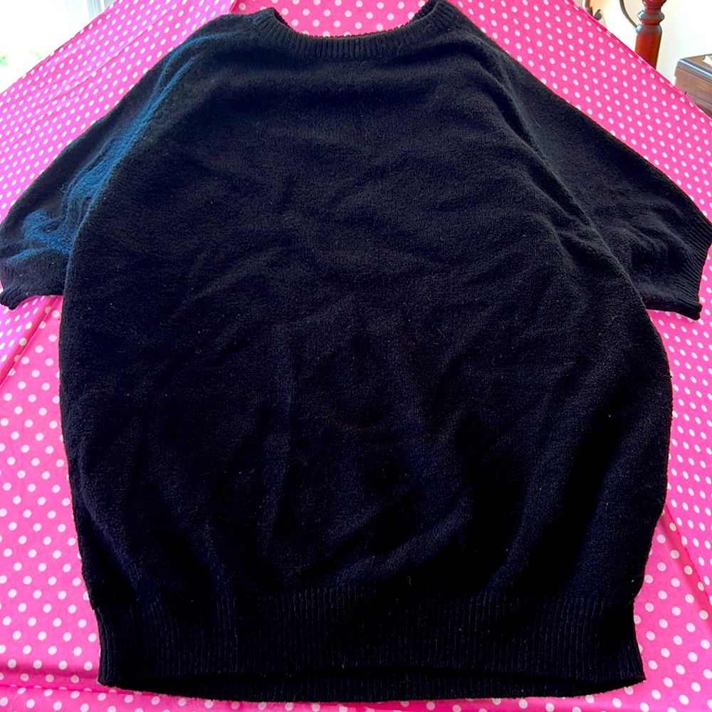 Short sleeve acrylic crew neck sweater worn but nice